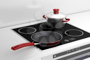 Frying pan and cooking pot at the induction stove