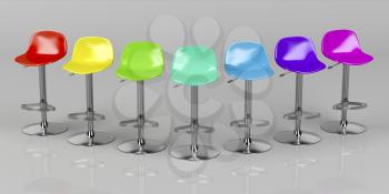 Unique colorful bar stools on shiny gray background, front view 