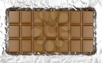 Milk chocolate bar on wrinkled aluminum foil 