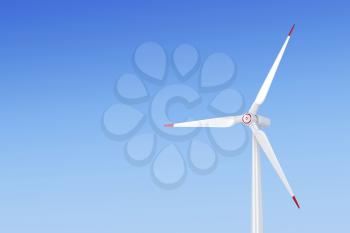 Wind turbine against blue sky 