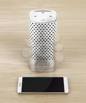 Silver smart speaker and smartphone on wood background 