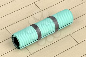 Rubber fitness mat on wood floor