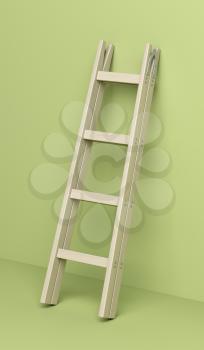 Wood double step ladder leaning against the green wall