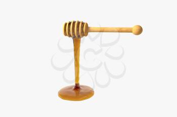 Golden honey drop from honey dipper, 3d rendering. Computer digital drawing.