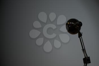 Decorative lamp and blank gray wall, 3d rendering. Computer digital drawing.