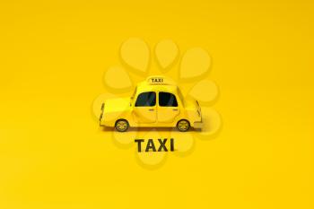 Mini 3D taxi, mini car with yellow color, 3d rendering. Computer digital drawing.