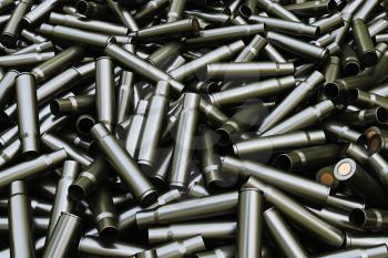 Background from military machine gun cartridges. Danger concept. 