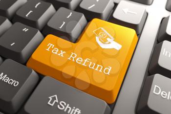 Tax Refund - Orange Button on Computer Keyboard. Internet Concept.