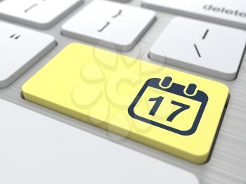 Desktop Calendar Icon on Yellow Computer Button.