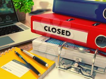 Red Office Folder with Inscription Closed on Office Desktop with Office Supplies and Modern Laptop. Business Concept on Blurred Background. Toned 3d Image.