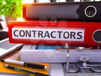 Red Office Folder with Inscription Contractors on Office Desktop with Office Supplies and Modern Laptop. Contractors Business Concept on Blurred Background. Contractors - Toned Image. 3D