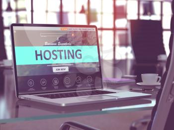 Modern Workplace with Laptop showing Landing Page with Hosting Concept. Toned Image with Selective Focus. 3D Render.