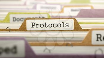 Protocols Concept on File Label in Multicolor Card Index. Closeup View. Selective Focus. 3D Render.