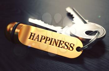 Keys to Happiness - Concept on Golden Keychain over Black Wooden Background. Closeup View, Selective Focus, 3D Render. Toned Image.