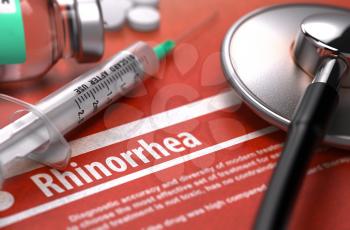 Rhinorrhea - Printed Diagnosis on Orange Background and Medical Composition - Stethoscope, Pills and Syringe. Medical Concept. Blurred Image. 3D Render.