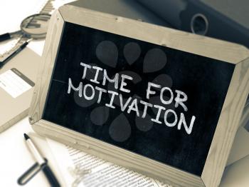 Hand Drawn Time for Motivation Concept  on Chalkboard. Blurred Background. Toned Image. 3D Render.