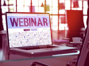 Webinar Concept - Closeup on Landing Page of Laptop Screen in Modern Office Workplace. Toned Image with Selective Focus. 3D Render.