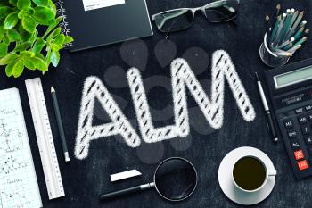 Top View of Office Desk with Stationery and Black Chalkboard with Business Concept - ALM. 3d Rendering. Toned Image.