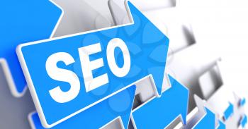 SEO on Blue Arrow on a Grey Background. Internet Concept.