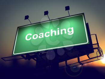 Coaching - Green Billboard on the Rising Sun Background.