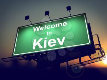 Welcome to Kiev - Green Billboard on the Rising Sun Background.