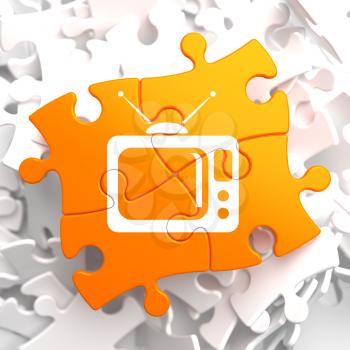 TV Set Icon on Orange Puzzle. Television Concept.