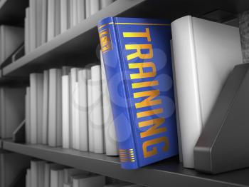 Training - Blue Book on the Black Bookshelf between white ones.