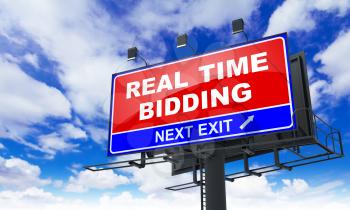 Real Time Bidding - Red Billboard on Sky Background. Business Concept.