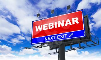 Webinar - Red Billboard on Sky Background. Business Concept.