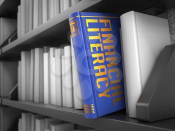 Financial Literacy  - Blue Book on the Black Bookshelf between white ones.