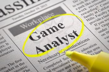 Game Analyst Vacancy in Newspaper. Job Seeking Concept.