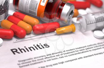 Rhinitis - Printed Diagnosis with Blurred Text. On Background of Medicaments Composition - Red Pills, Injections and Syringe.