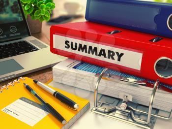 Red Office Folder with Inscription Summary on Office Desktop with Office Supplies and Modern Laptop. Business Concept on Blurred Background. Toned Image.