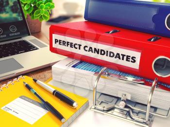 Perfect Candidates - Red Office Folder on Background of Working Table with Stationery, Laptop and Reports. Business Concept on Blurred Background. Toned Image.