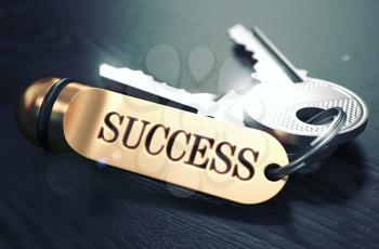 Keys to Success - Concept on Golden Keychain over Black Wooden Background. Closeup View, Selective Focus, 3D Render. Toned Image.