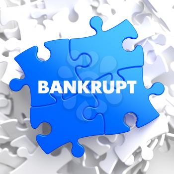 Bankrupt on Blue Puzzle on White Background.