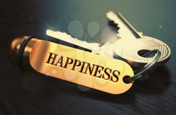 Keys to Happiness - Concept on Golden Keychain over Black Wooden Background. Closeup View, Selective Focus, 3D Render. Toned Image.