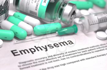 Emphysema - Printed Diagnosis with Mint Green Pills, Injections and Syringe. Medical Concept with Selective Focus.