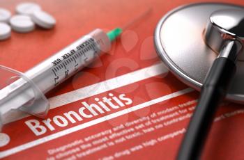 Bronchitis - Printed Diagnosis with Blurred Text on Orange Background and Medical Composition - Stethoscope, Pills and Syringe. Medical Concept.