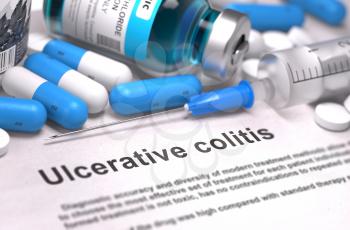 Diagnosis - Ulcerative Colitis. Medical Report with Composition of Medicaments - Blue Pills, Injections and Syringe. Blurred Background with Selective Focus.