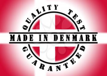 Quality test guaranteed stamp with a national flag inside, Denmark