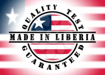 Quality test guaranteed stamp with a national flag inside, Liberia