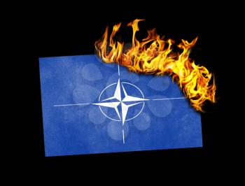 Flag burning - concept of war or crisis - NATO