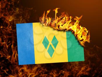 Flag burning - concept of war or crisis - Saint vincent and the grenadines