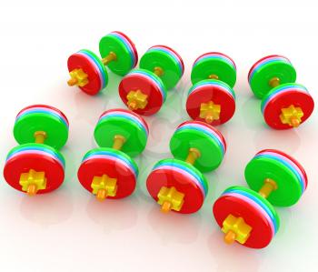 Colorful dumbbells on a white background