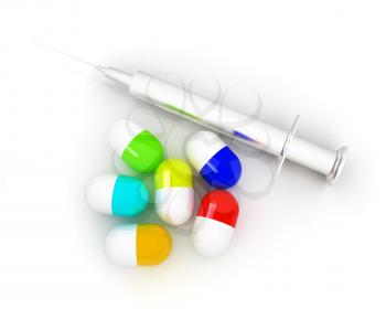 Pills and syringe on a white background