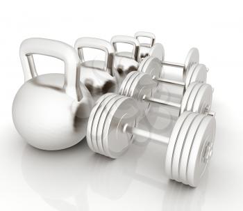 Metall weights and dumbbells on a white background