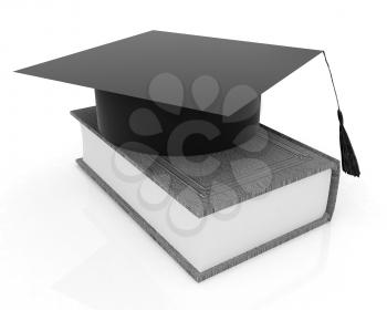 Graduation hat on a leather book on a white background