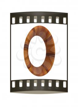 Wooden number 0- zero on a white background. The film strip