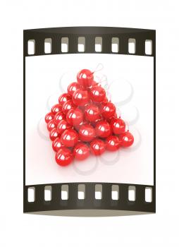 Traditional Christmas toys on a reflective background. The film strip